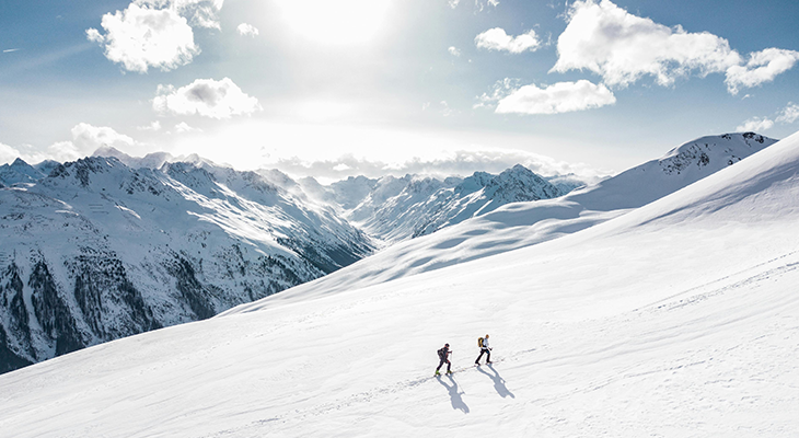 Affordable winter vacations guide 2025—beach, ski, and city skyline collage