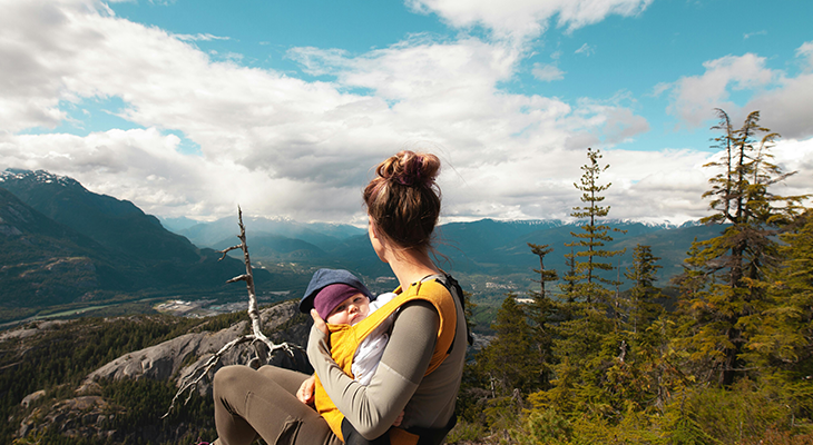 Parents evaluating map choosing best place to travel with infant for 2025 trip