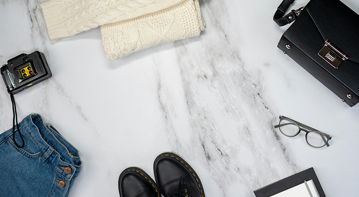 Minimalist capsule wardrobe items layout