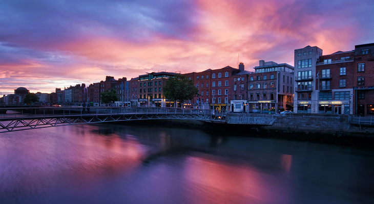Best time to visit Dublin: Sunset over the River Liffey with city skyline