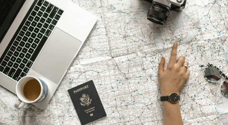 tips for travelers hero image suitcase passport map