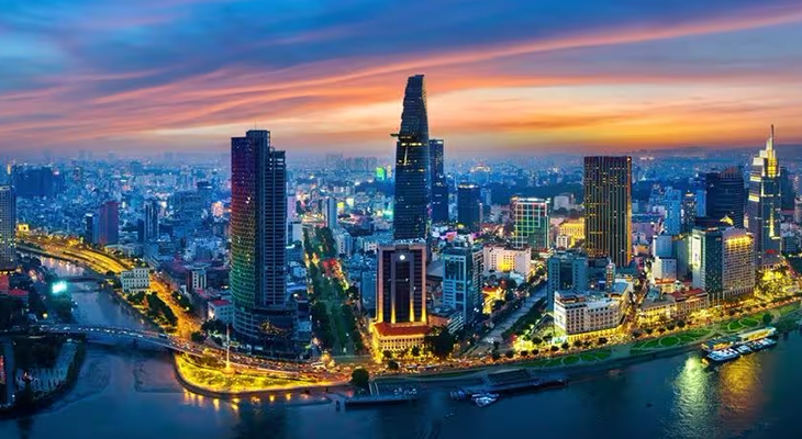 Trip to Ho Chi Minh City—skyline view of Saigon with river at sunset