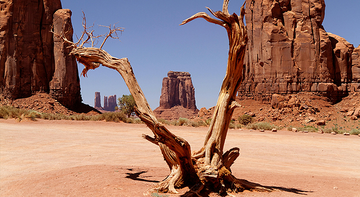 southwest road trips panorama of Monument Valley at sunrise